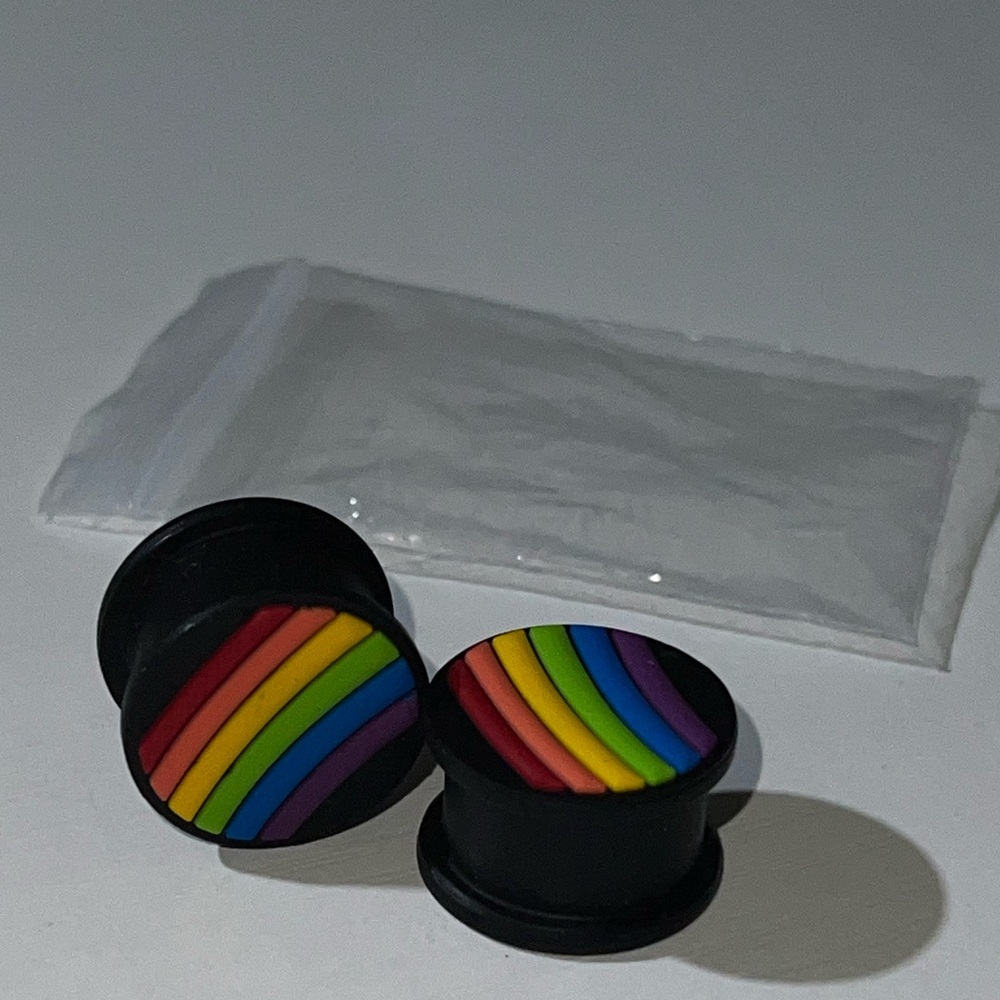 5/8” ear gauges , soft silicone rainbows